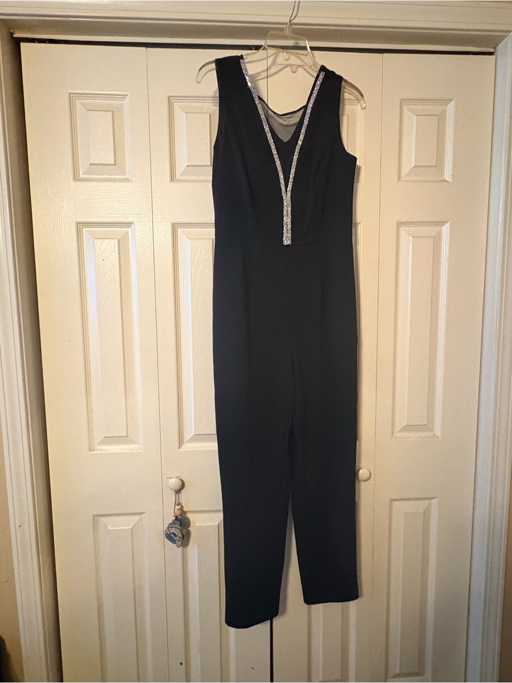 Women’s Black Sleeveless Jumpsuit with Silver Trim
